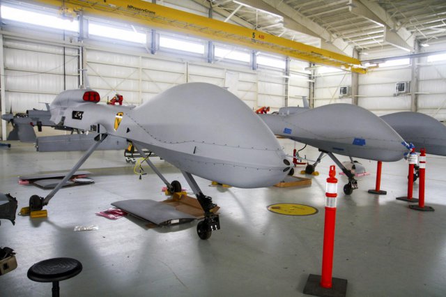 MQ-1C Gray Eagles await maintenance at the maintenance facility at Fort Hood, Texas.