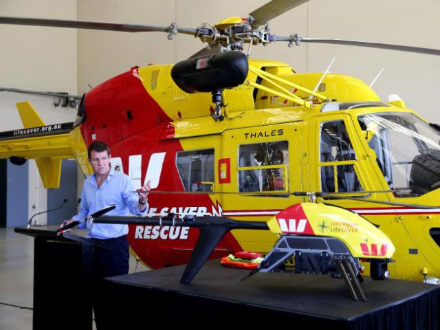 Premier Mike Baird launches the Westpac "Little Ripper" mini drone to hunt and spot sharks off the NSW coast. Picture Gregg Porteous