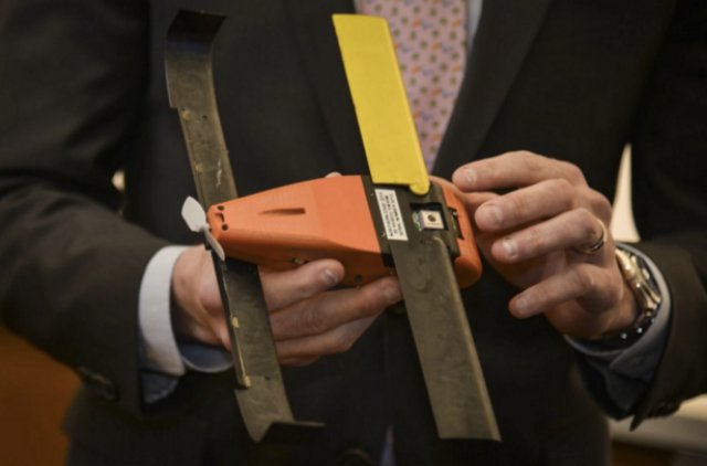 Dr. William Roper, director of the Defense Department’s Strategic Capabilities Office, holds a micro-drone at the organization’s home in the Defense Advanced Research Projects Agency building on Friday, March 4, 2016, in Arlington, Va. (Photo by Jahi Chikwendiu/The Washington Post)