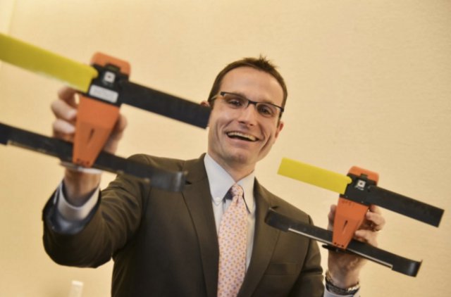 William Roper, director of the Defense Department’s Strategic Capabilities Office, shows the U.S. military’s new micro-unmanned aerial vehicle, (Photo by Jahi Chikwendiu/The Washington Post)