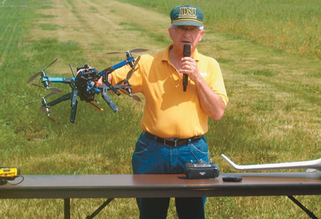 John Nowatzki, NDSU ag machine systems specialist, shows a UAV at a recent field days in Dickinson, N.D.