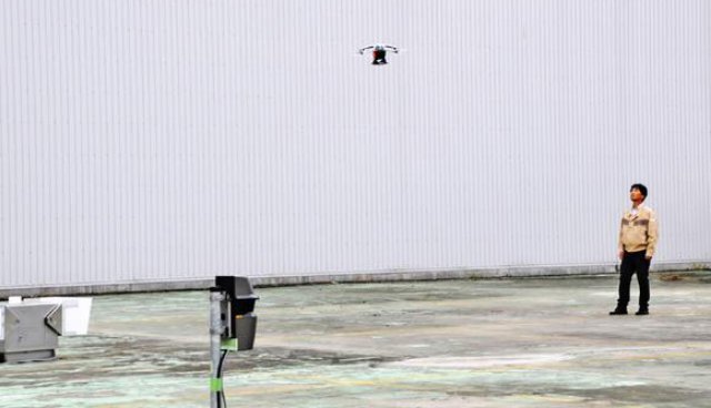 When a remote sensor detects an intruder, Secom's security drone takes off automatically, pursuing the target and taking photos