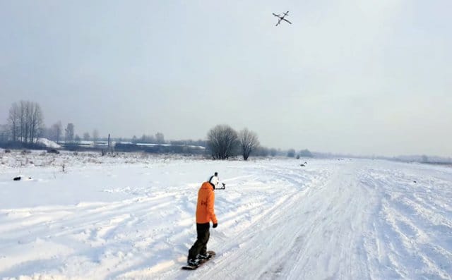 Droneboarding - Snowboarder Towed by a Drone