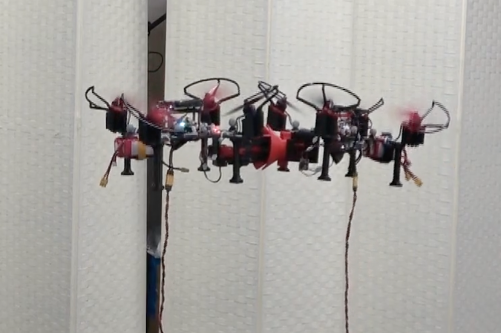 Drones Can Lock Together in Mid-Air to Form a Bigger, Stronger Robot