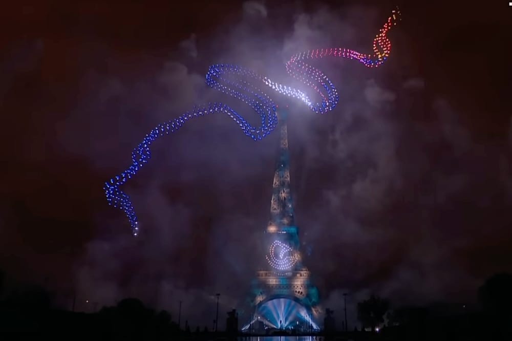 Drones and Fireworks Light Up the Eiffel Tower on Bastille Day in Paris