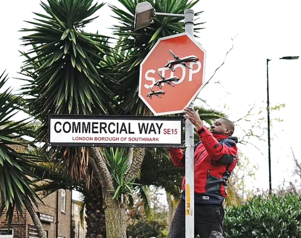 Banksy 'Stop Drones' Street Sign Stolen - Two Arrested