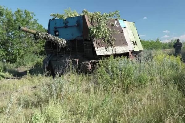 Ukraine Captures Russian 'Barn' Tank Modified Against Drone Threats