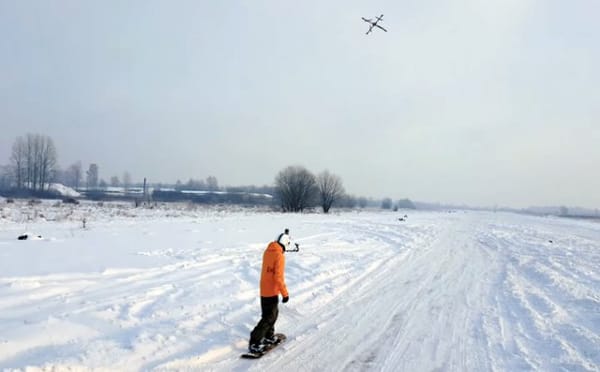 Droneboarding - Snowboarder Towed by a Drone